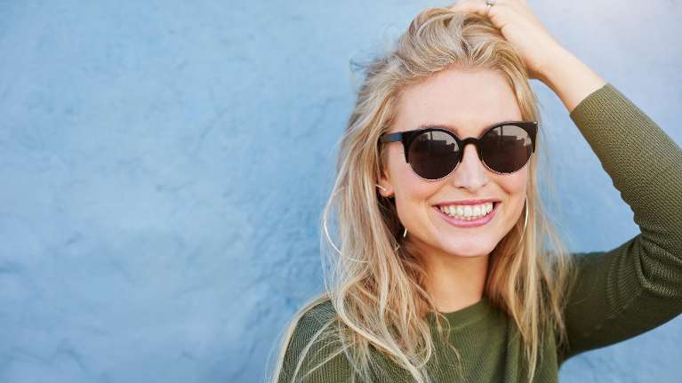 tacoma woman smiling with sunglasses